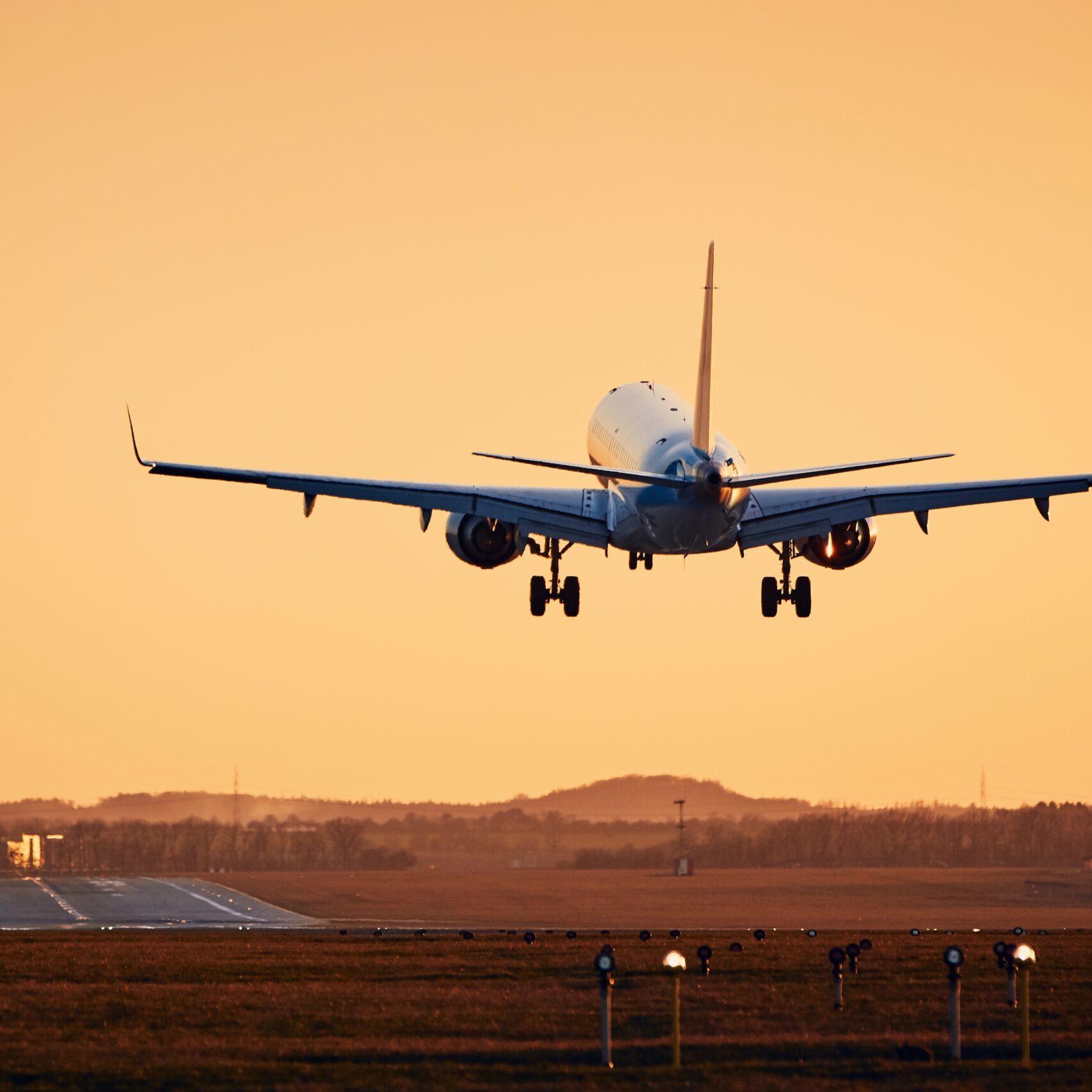 Airplane landing on runway